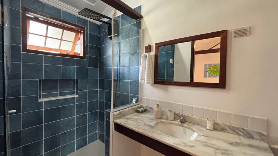 Classic Triple Room, Multiple Beds | Bathroom | Shower, rainfall showerhead, free toiletries, hair dryer