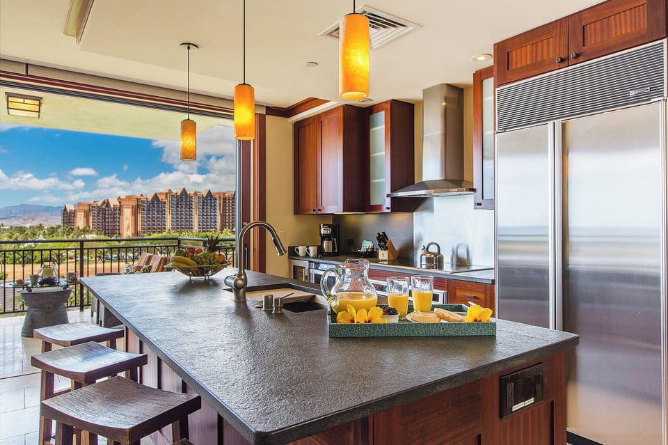 Condo, Multiple Beds, Balcony, Ocean View (Hale Leilani) | Private kitchen | Coffee/tea maker, fridge, microwave, oven