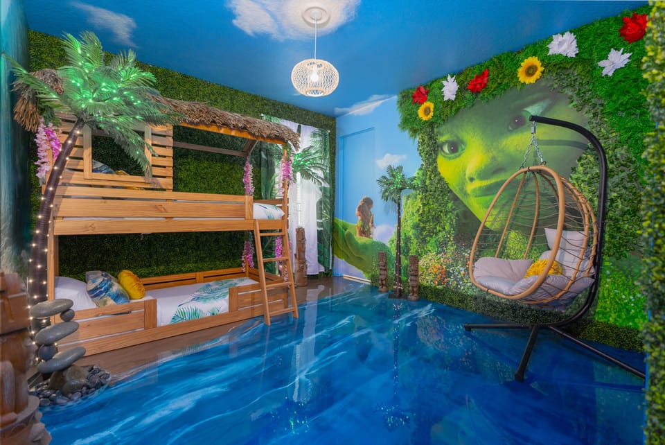 Moana's Bedroom downstairs with twin bunkbeds and ocean flooring!