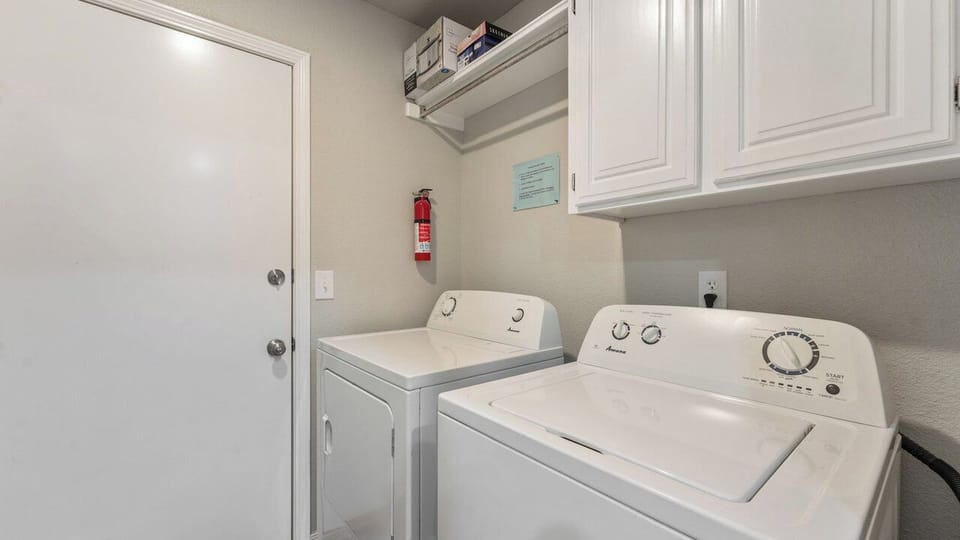 Laundry room between garage and kitchen.