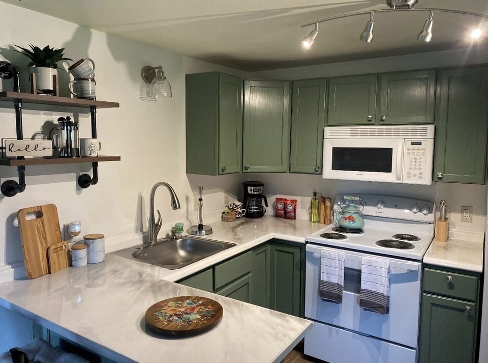 Fully stocked, stylish, and full sized kitchen. Rare find in a cabin! 