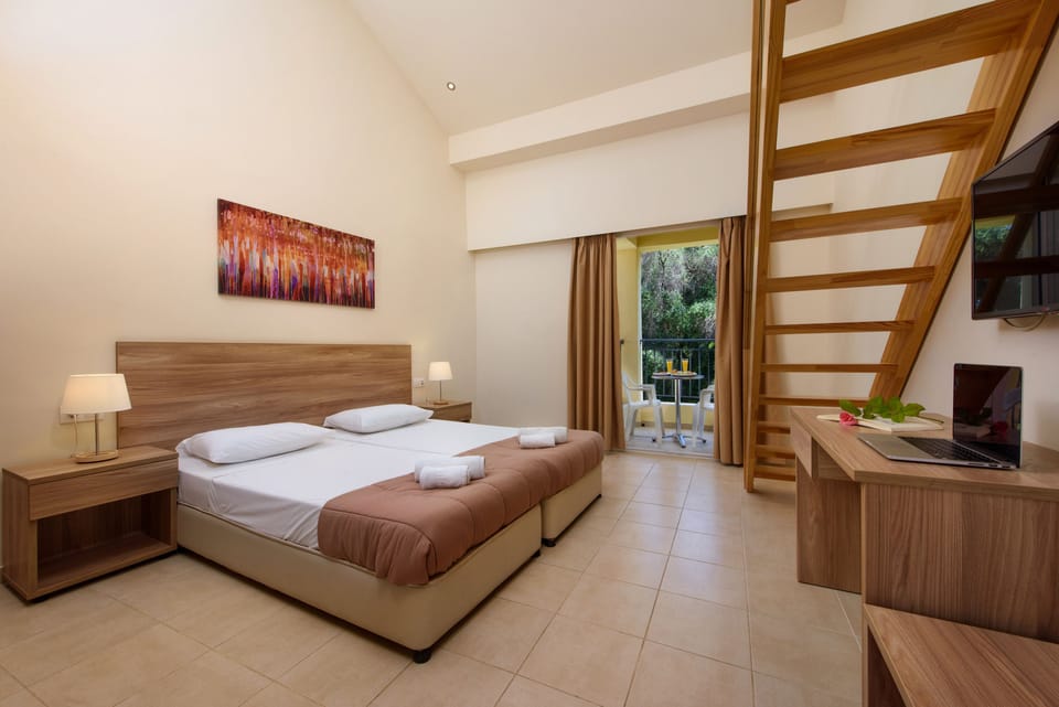 Maisonette  (Pool or Sea View) | In-room safe, iron/ironing board, WiFi, bed sheets