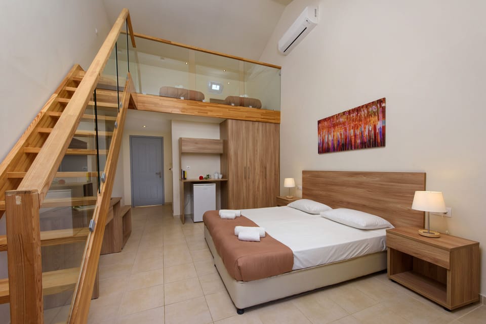 Maisonette  (Pool or Sea View) | In-room safe, iron/ironing board, WiFi, bed sheets