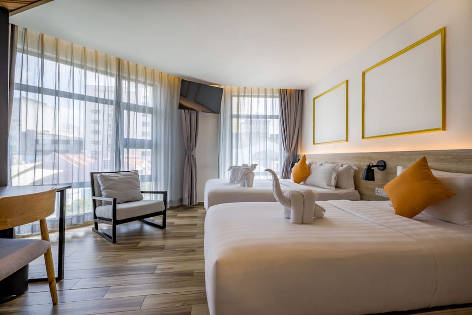 Family Triple Room | Hypo-allergenic bedding, in-room safe, desk, laptop workspace