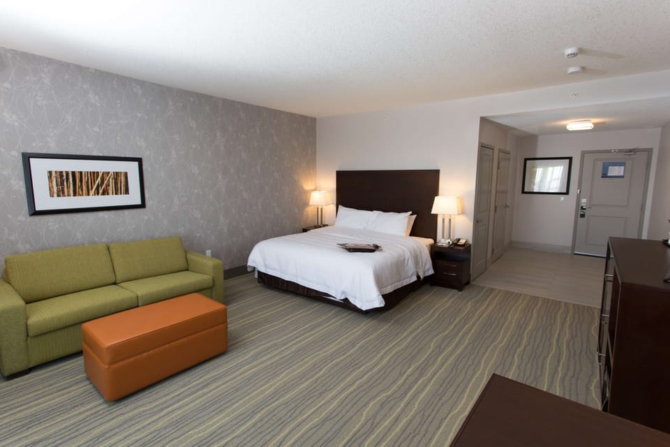 Room, 1 King Bed, Accessible (Roll In Shower) | In-room safe, desk, laptop workspace, blackout drapes