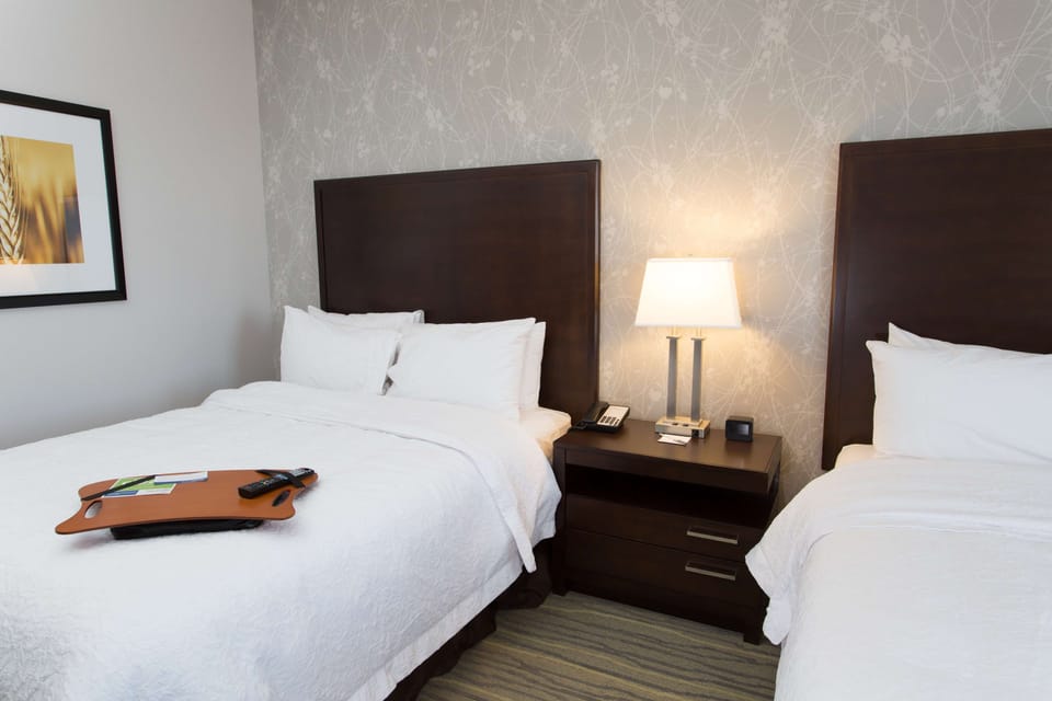 Room, 2 Queen Beds, Refrigerator & Microwave | In-room safe, desk, laptop workspace, blackout drapes