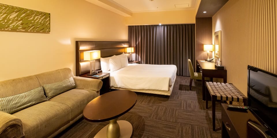 Down comforters, minibar, desk, blackout drapes