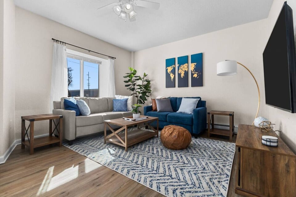 Spacious and comfortable living area with plenty of seating for family and friends. The living area has plenty of natural light!