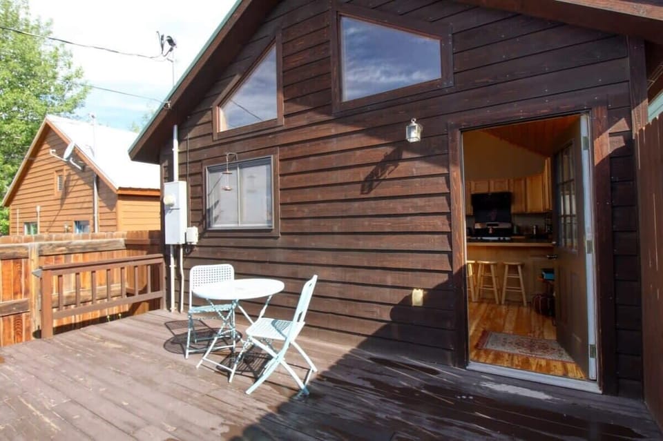 【Back Deck】 Gas grill + dining table + hot tub — the outdoor room is the centerpiece.