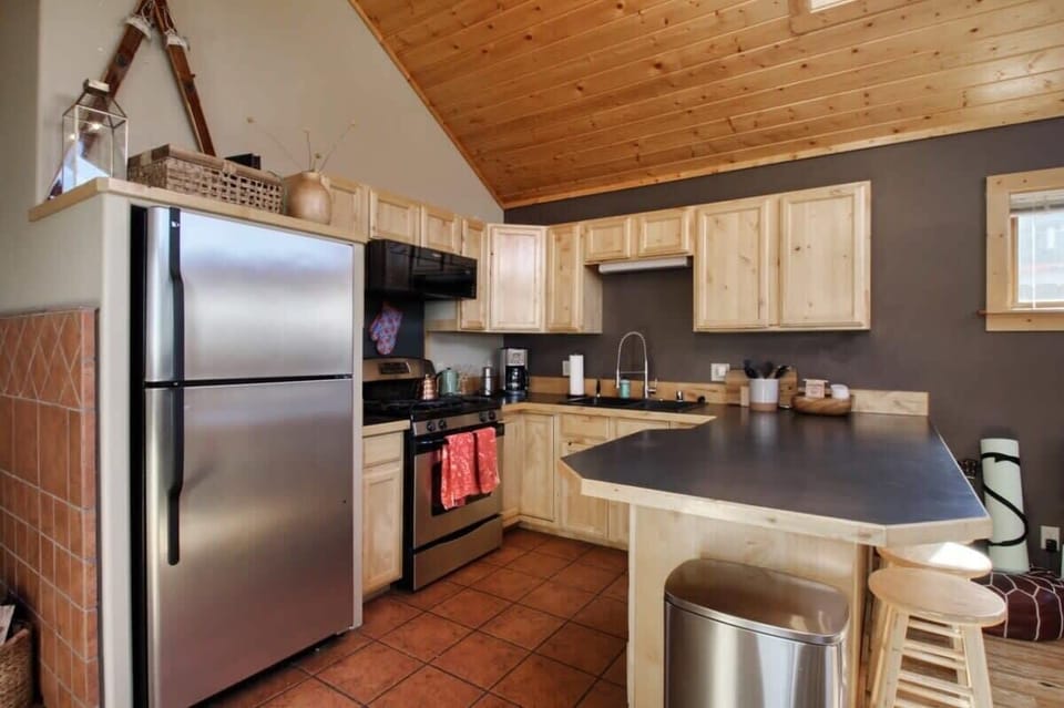 【Kitchen】 Fully equipped — range, fridge, dishwasher, coffee. Cook home for four.