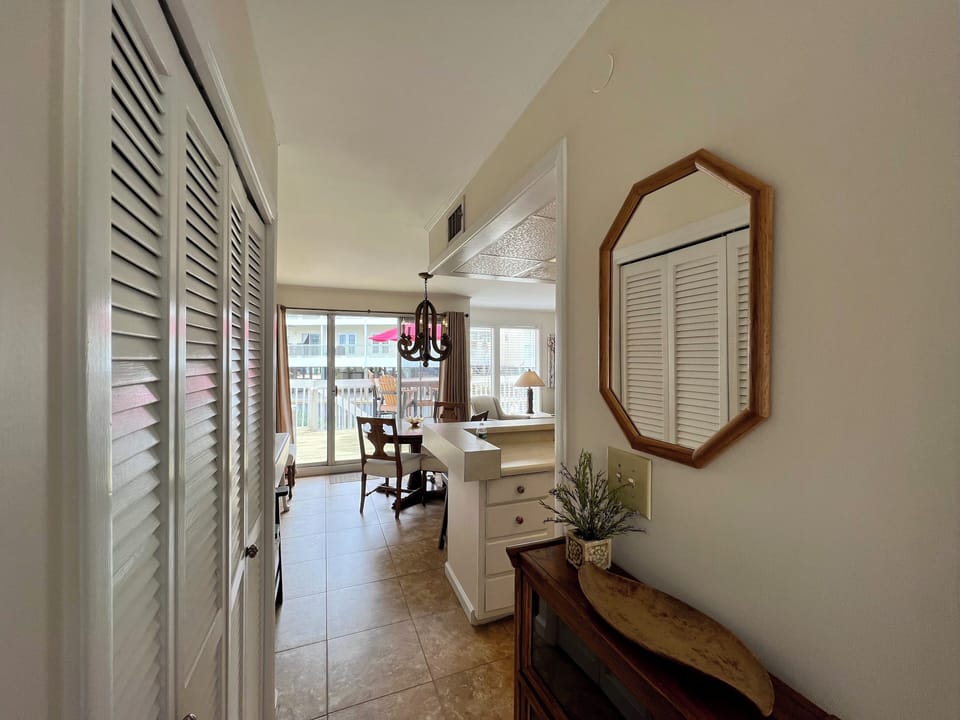 Step into your bright, airy space where elegant wood accents and coastal charm create the perfect work-from-paradise retreat.