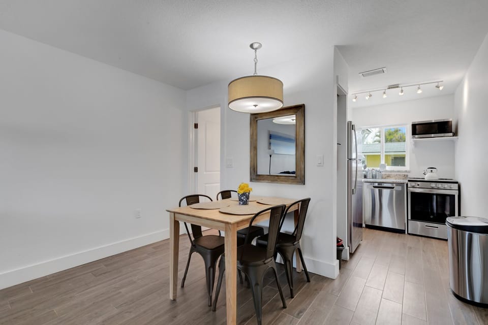 Dining  Enjoy a nice home cooked meal or some takeout with your family on the table fit for 4