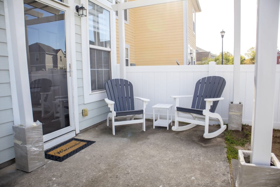 Seating outside backdoor and within the fence