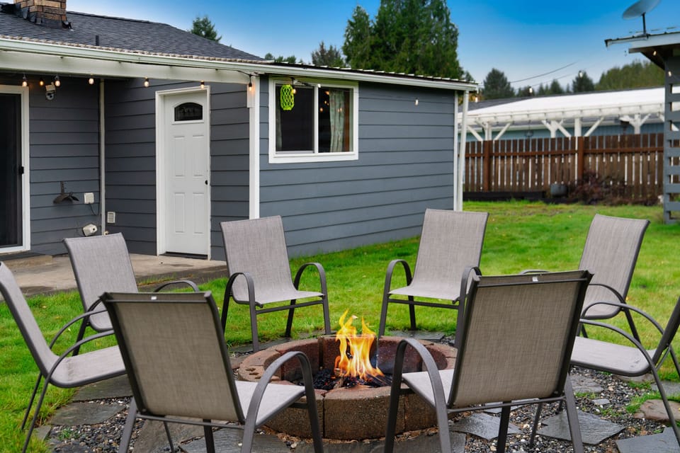 The backyard is really big & has a fire pit too!