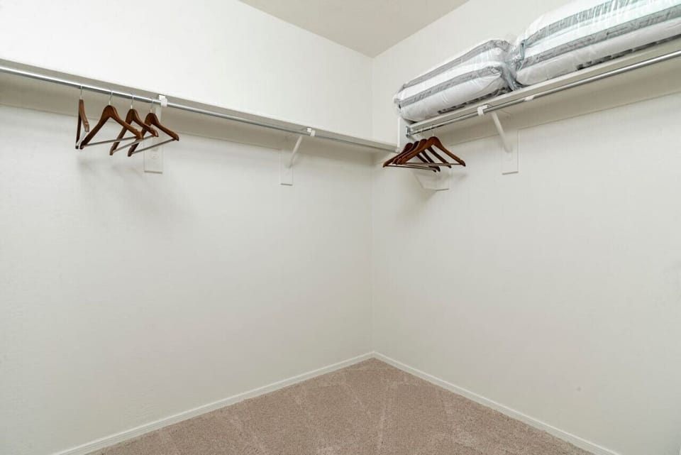 Our spacious walk-in closet features ample hangers and shelves, ensuring that your clothing stays clean and wrinkle-free throughout your stay.