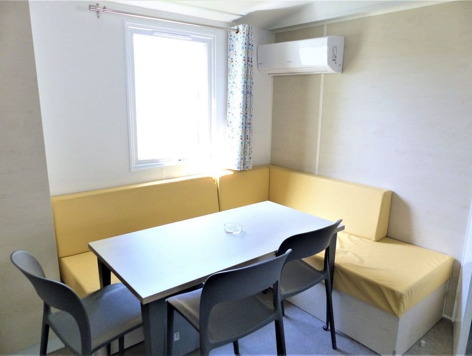  A neat dining area in a compact space.