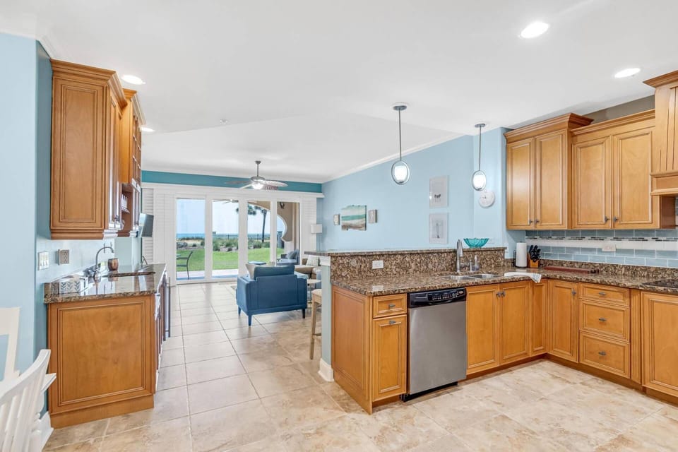 Enjoy an open concept living space with stunning ocean views right from the kitchen!