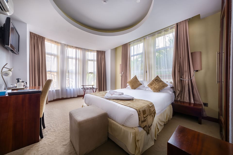 Standard Room | 10 bedrooms, Egyptian cotton sheets, minibar, in-room safe