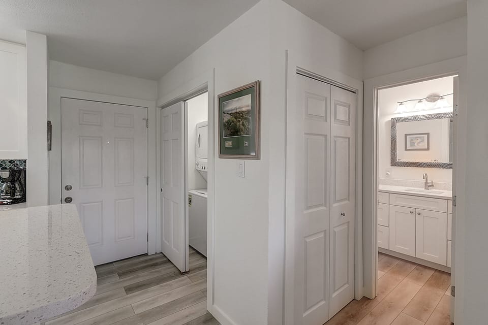 Your convenient utility area keeps everything organized with in-unit laundry, ample storage, and easy access to your bright bathroom.