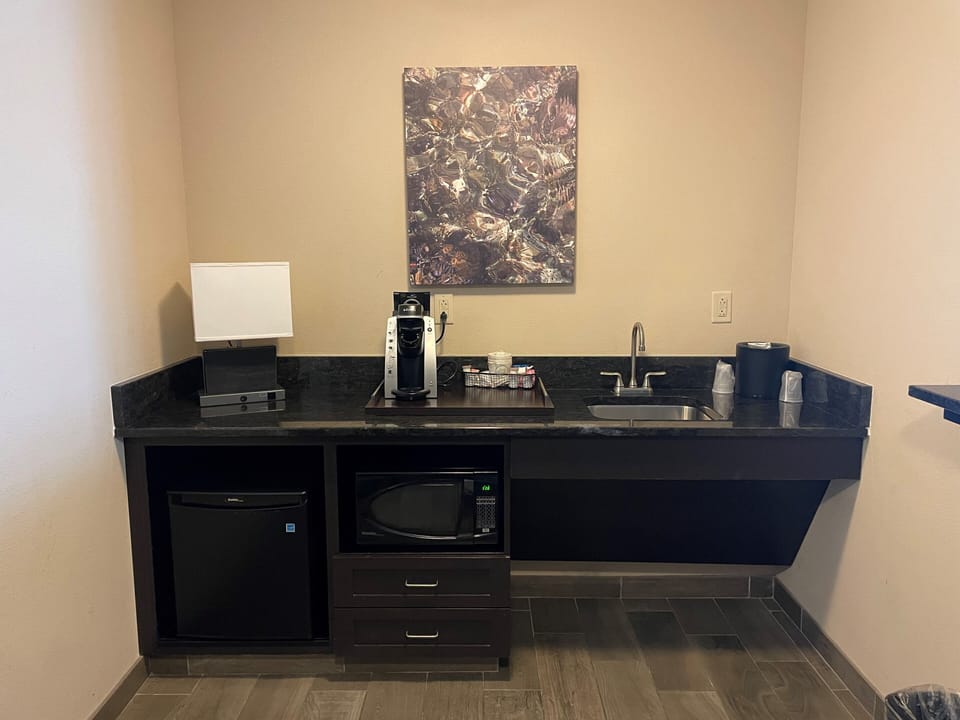 Desk, blackout drapes, soundproofing, iron/ironing board