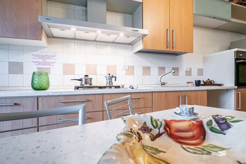 Big kitchen with direct access to the terrace
