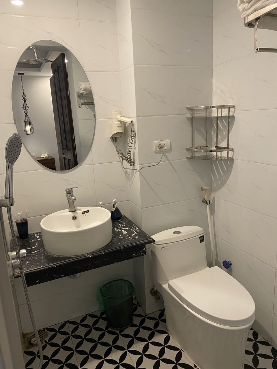 Shower, hydromassage showerhead, designer toiletries, hair dryer