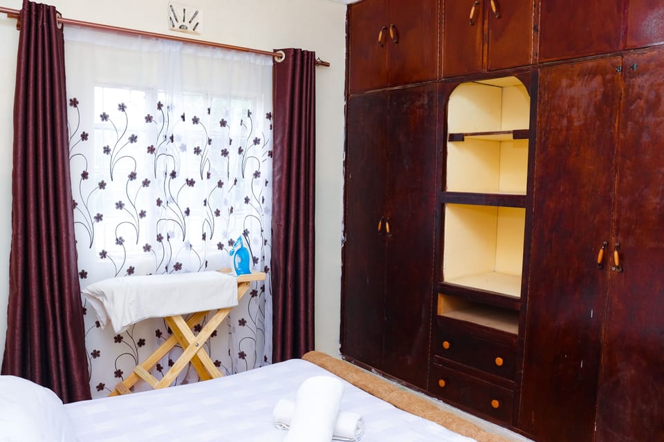 Family Room | Desk, blackout drapes, iron/ironing board, free WiFi