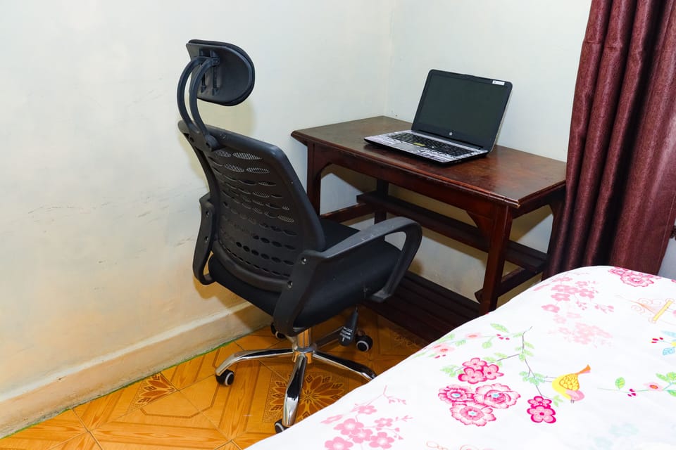 Family Room | Desk, blackout drapes, iron/ironing board, free WiFi