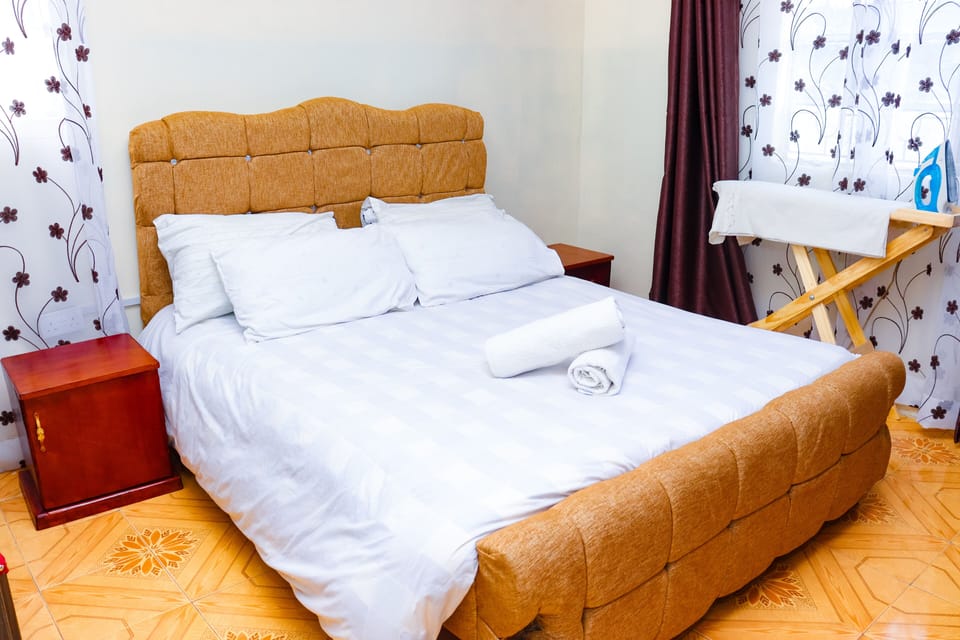 Family Room | Desk, blackout drapes, iron/ironing board, free WiFi