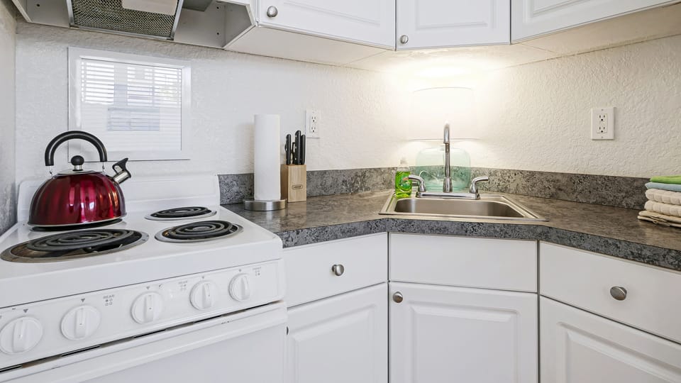 #11 Family Queen Suite, 1B/1B | Private kitchen | Full-size fridge, microwave, oven, stovetop