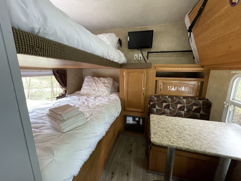 Two more beds can be converted on the right side of the room to sleep 4 total.