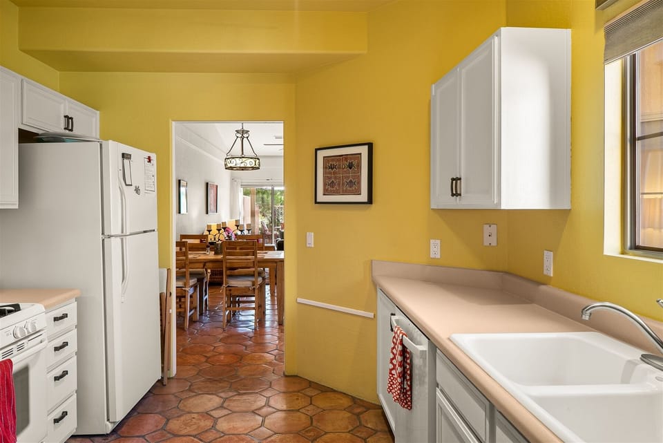 The kitchen is clean and well-equipped