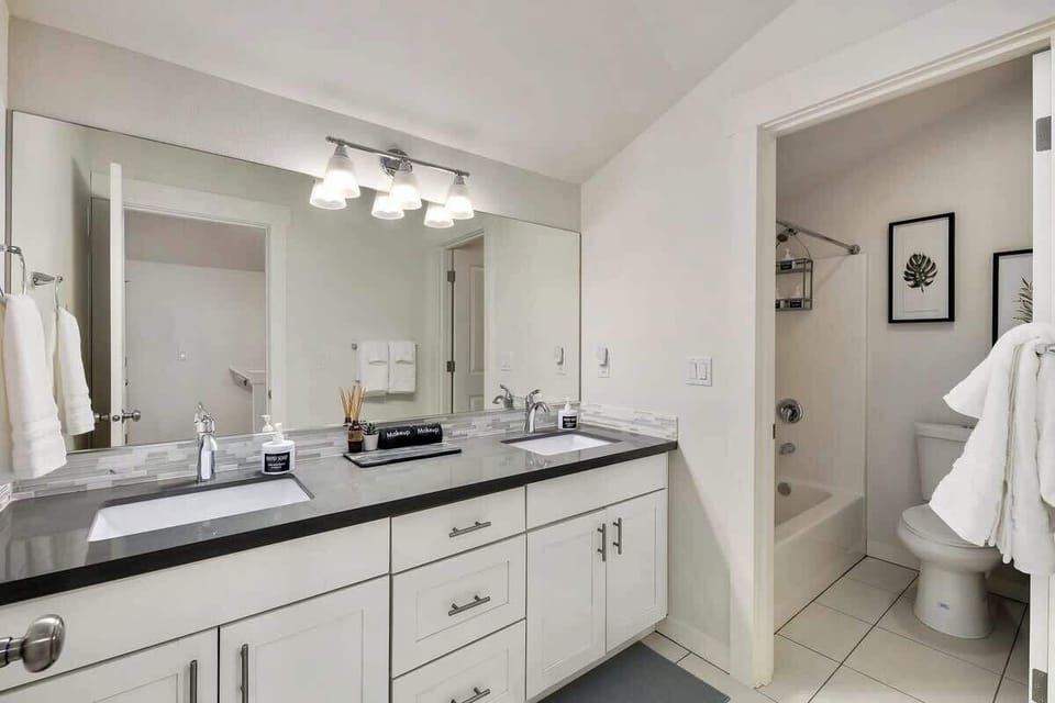Full bath with double sink vanity on 3rd floor