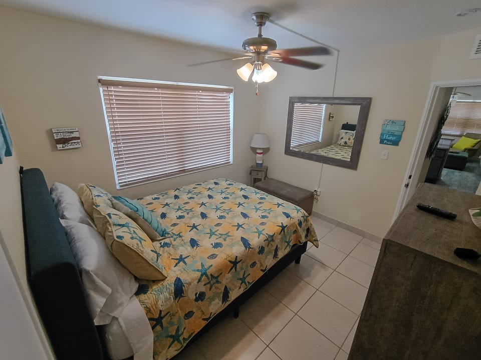Queen bed, relatively firm, plenty of pillows, Roku TV. 