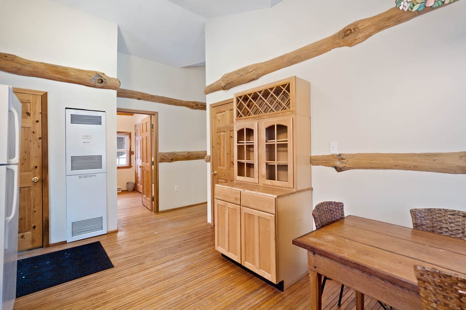 Kitchen - Main Level - Spacious kitchen with cupboard and dining area. Great for groups.
