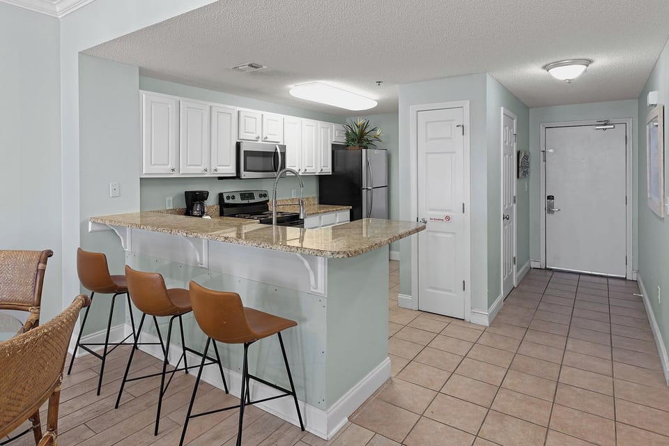 Fully Equipped Kitchen with Bar Seating