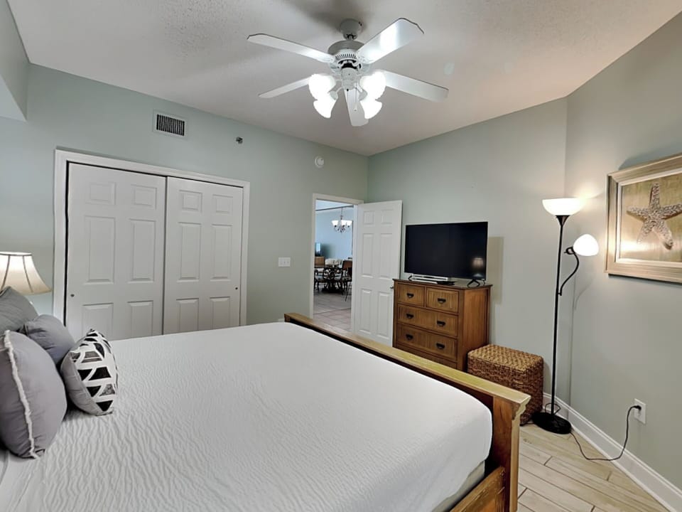Second Bedroom - TV and Adjacent Hallway Full Bathroom
