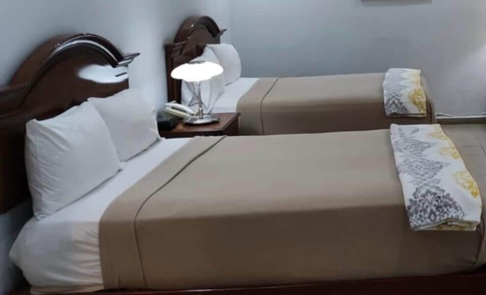 Standard Room, 2 Queen Beds | Pillowtop beds, in-room safe, desk, WiFi (free)
