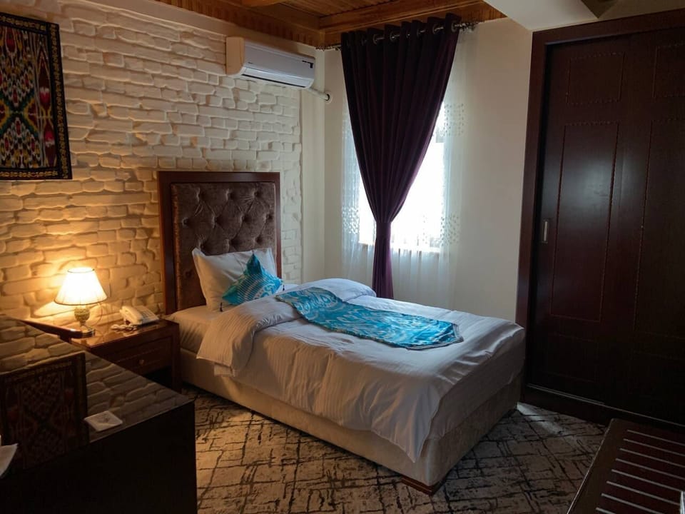 Standard Single Room | Living area | Smart TV