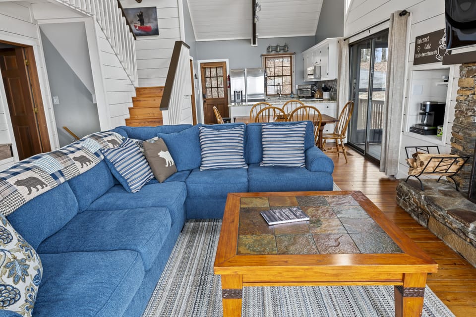 Living room with fireplace and queen sleeper sofa