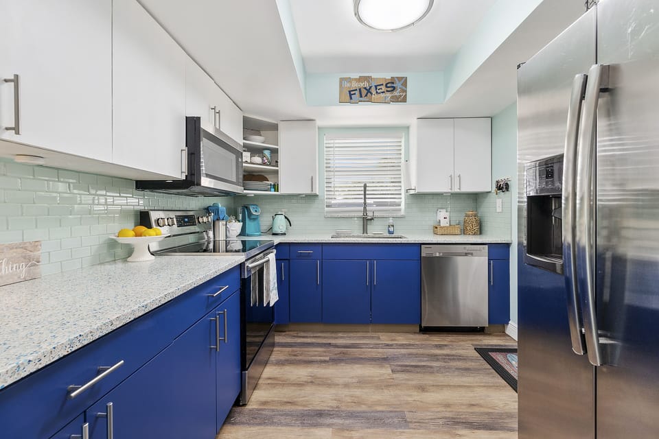 Fully-equipped kitchen with stainless steel appliances