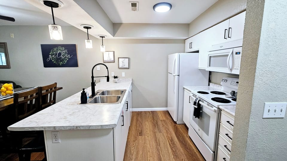 Fully stocked kitchen including grill tools