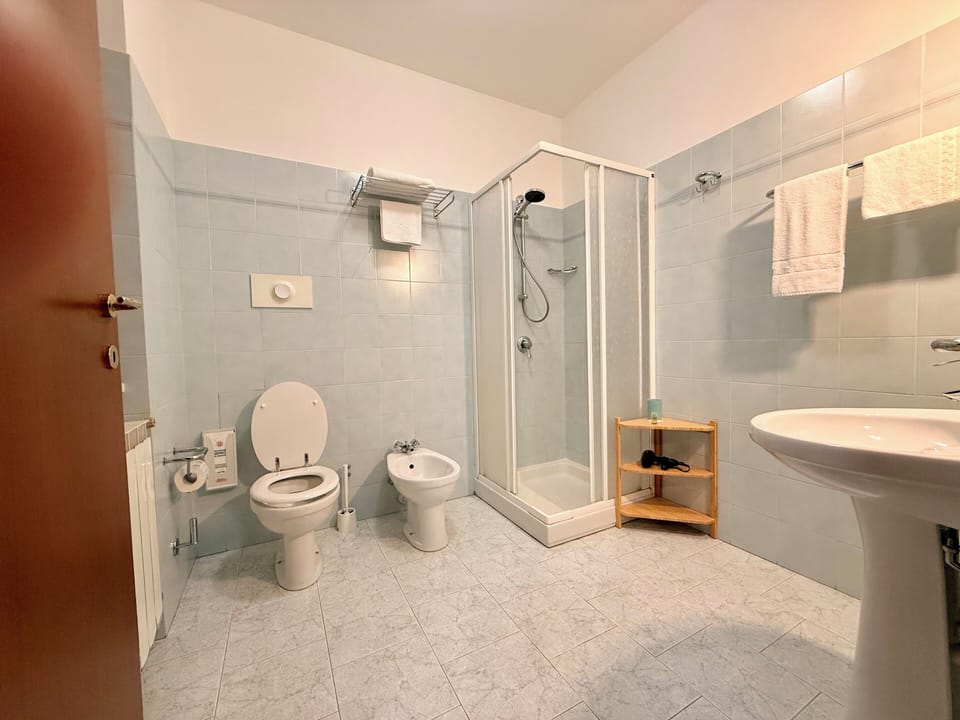 Panoramic Triple Room, Balcony, Lake View | Bathroom | Hair dryer, bidet, towels, soap