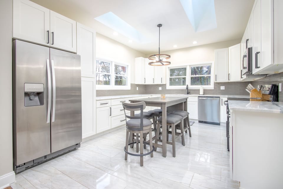 Newly renovated kitchen with island and seating for 5