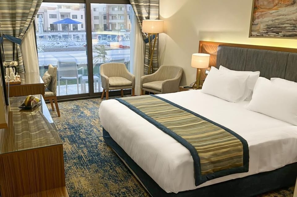 Standard Double or Twin Room | Minibar, in-room safe, desk, laptop workspace