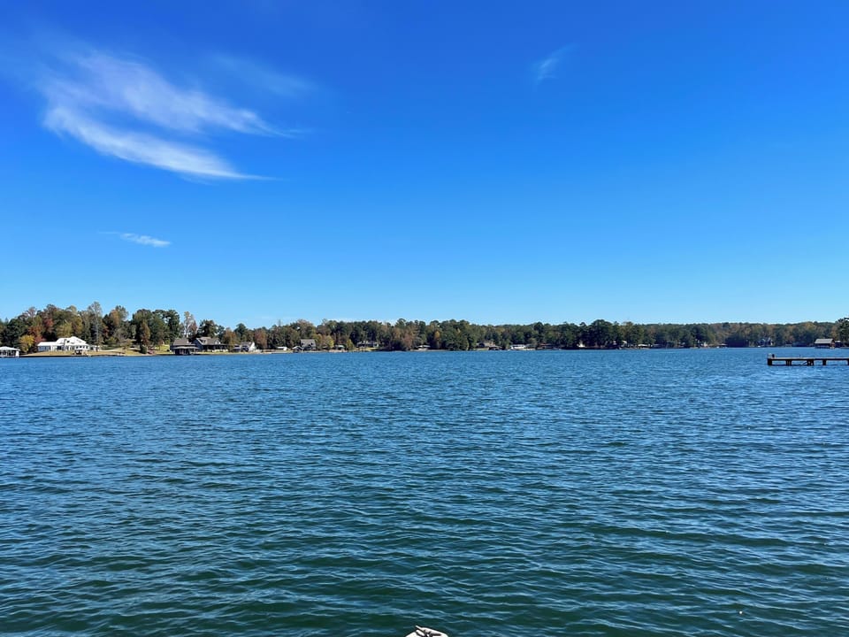 This lake view will never get old. Enjoy the sunsets from the dock at Sweet Sues