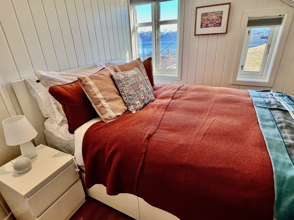 Bedroom 1 (Amber) - double room with stunning fjord and glacier views