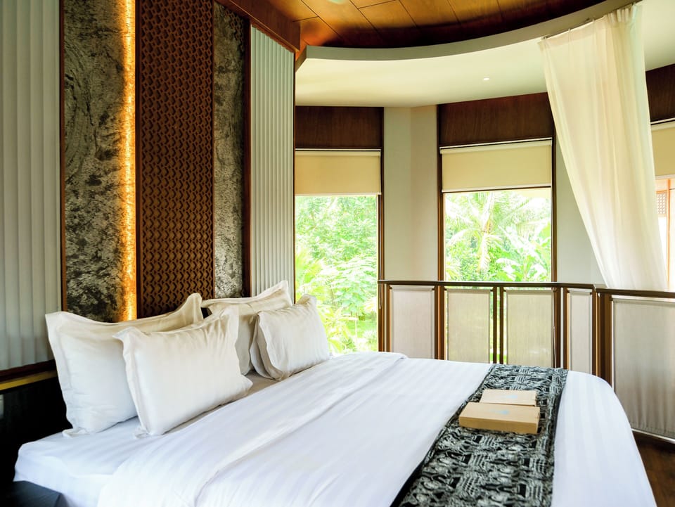 Premium bedding, down comforters, pillowtop beds, minibar