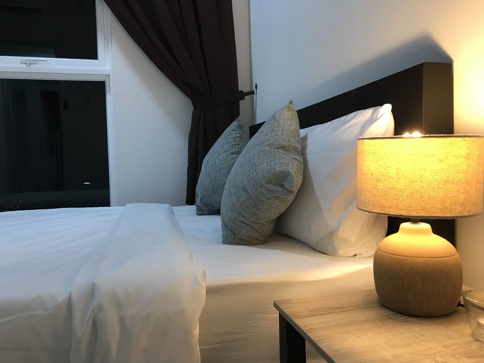 Standard Double Room, City View | Desk, laptop workspace, blackout drapes, iron/ironing board