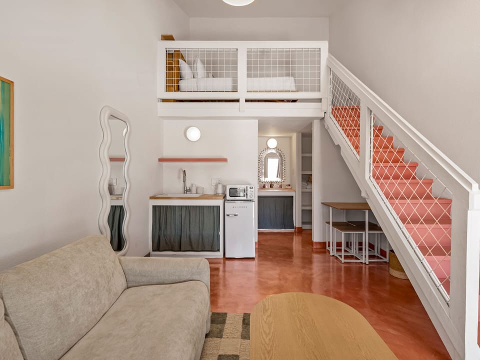 Deluxe Studio, 1 Queen Bed with Sofa bed | Living area | 32-inch Smart TV with digital channels, Netflix, Hulu
